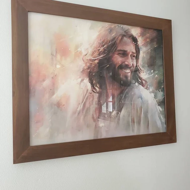 Smiling Jesus artwork in dark wooden frame